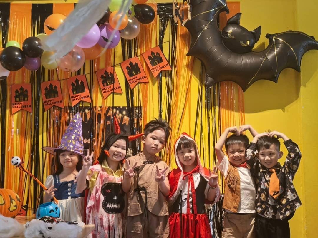 DuoDuo children in costumes at a Halloween celebration