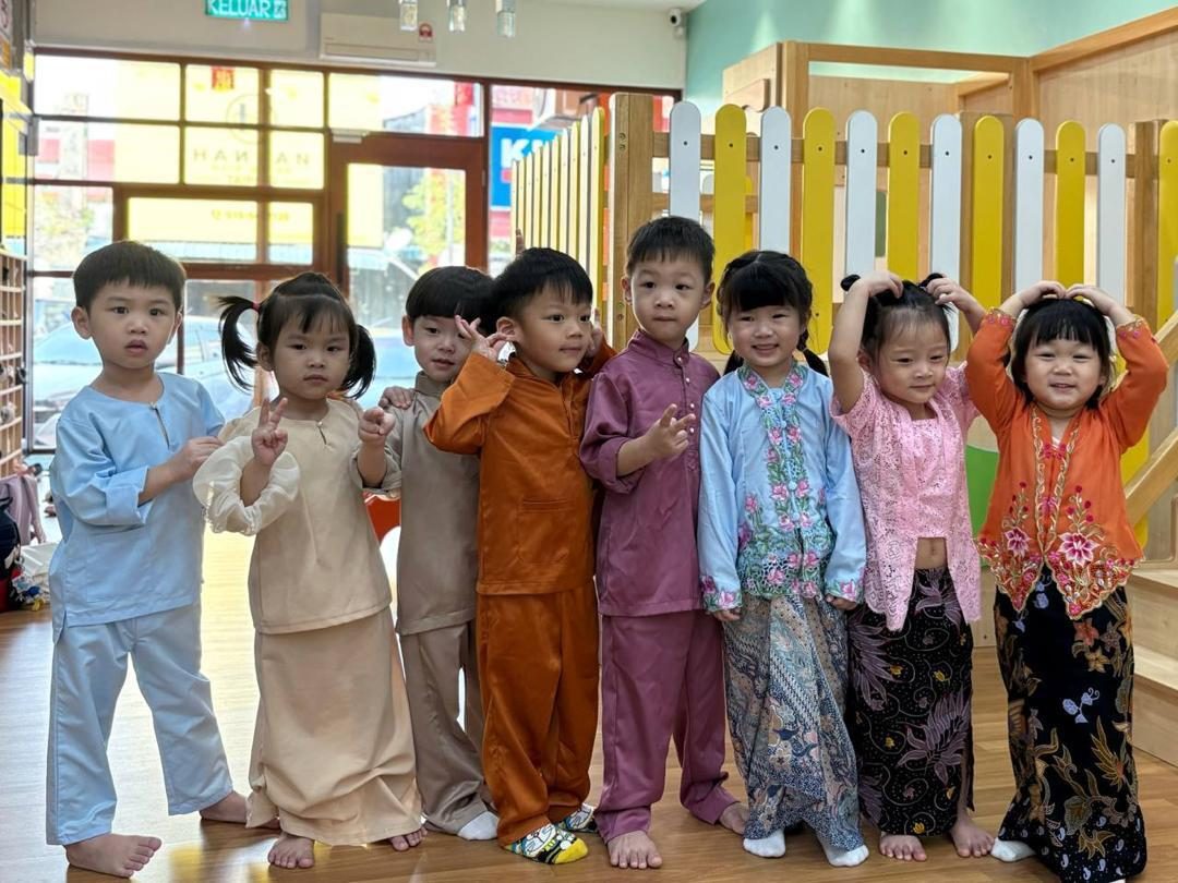 DuoDuo children in baju Melayu and kebaya celebrating Hari Raya